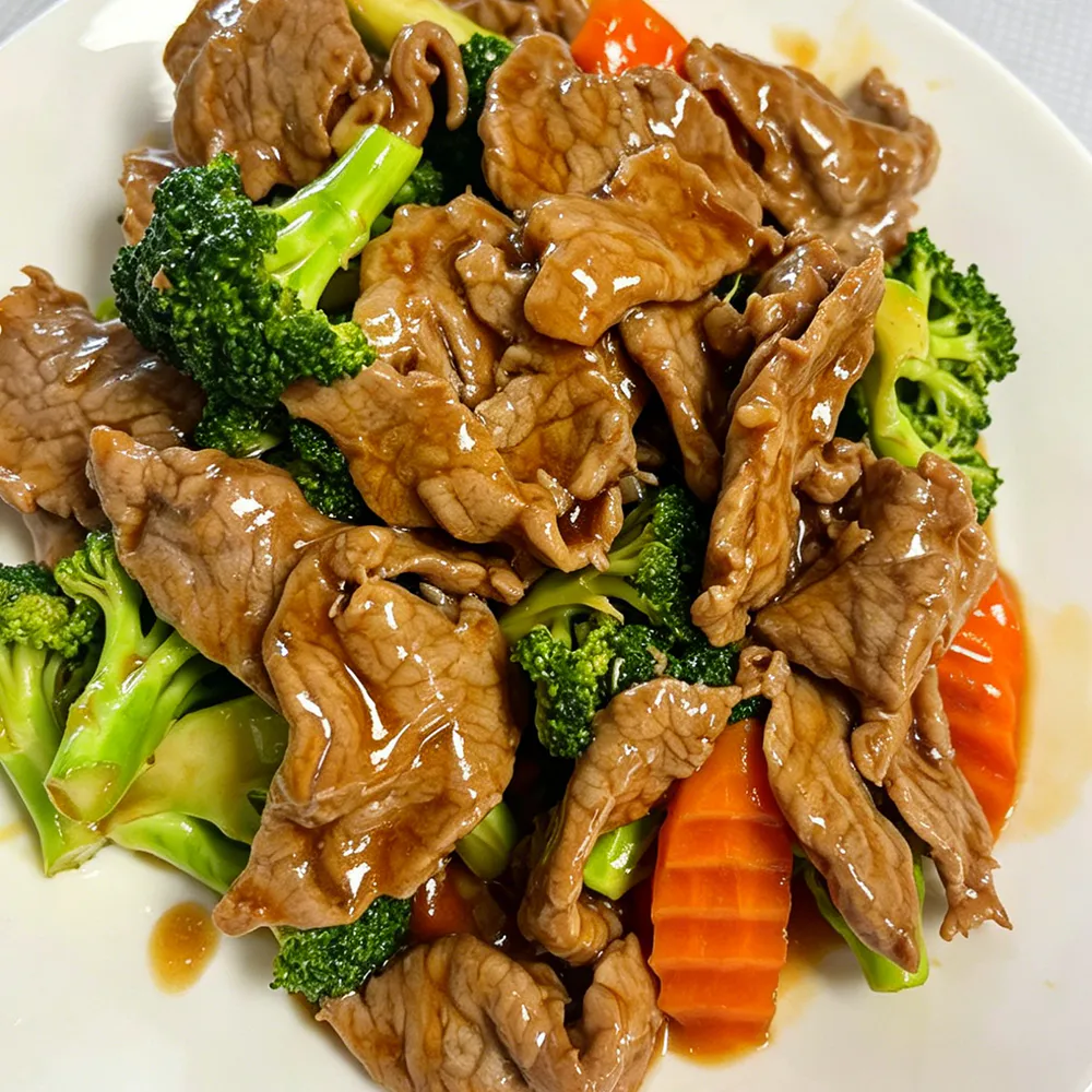 Tender beef stir-fried with fresh broccoli in savory sauce at Hongda Dough House, a Chinese Restaurant in North Plains